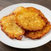 Side dish served with doner kebab meat, featuring fresh vegetables and a savory sauce